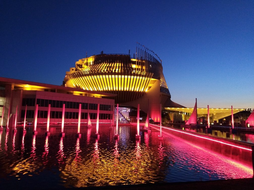 Montreal Casino & Hotel — the striking modernist pavilion on Île Notre-Dame glowing over the St Lawrence River at night.